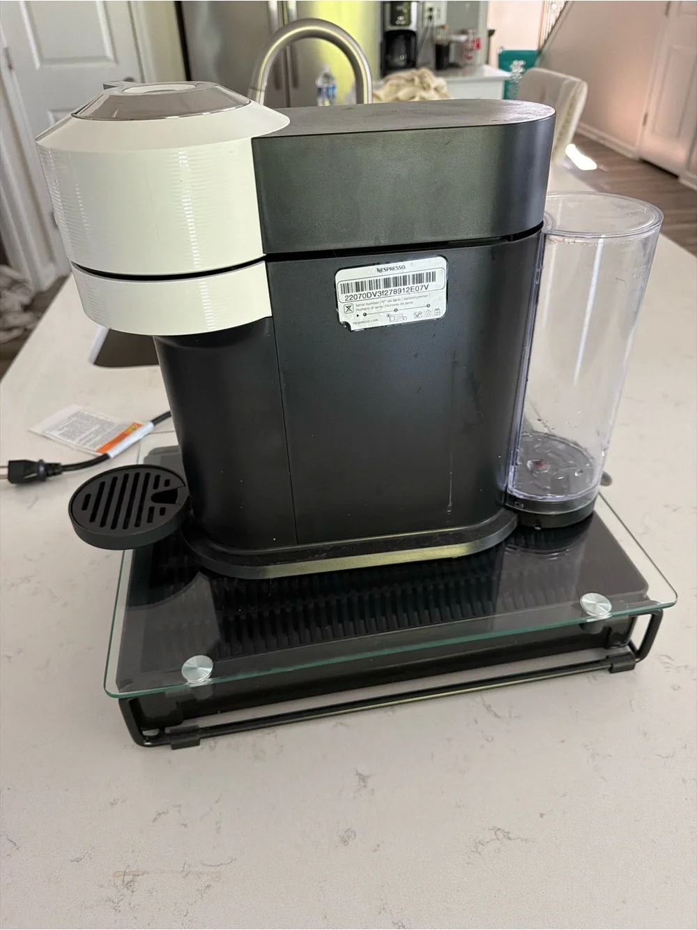 Nespresso Capsule Espresso Machine in White and Black & pod holder